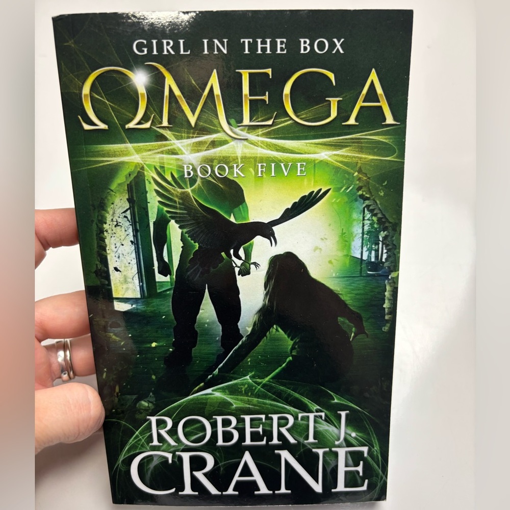 Omega: The Girl in the Box, Book Five Paperback book by Robert J. Crane